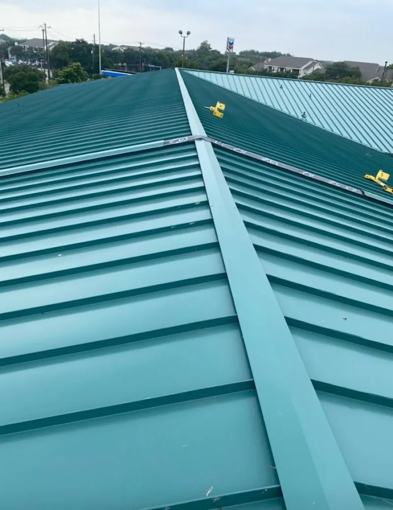 Green commercial metal roof ridge and valley for Metal Roof Repair in Elk Grove Village