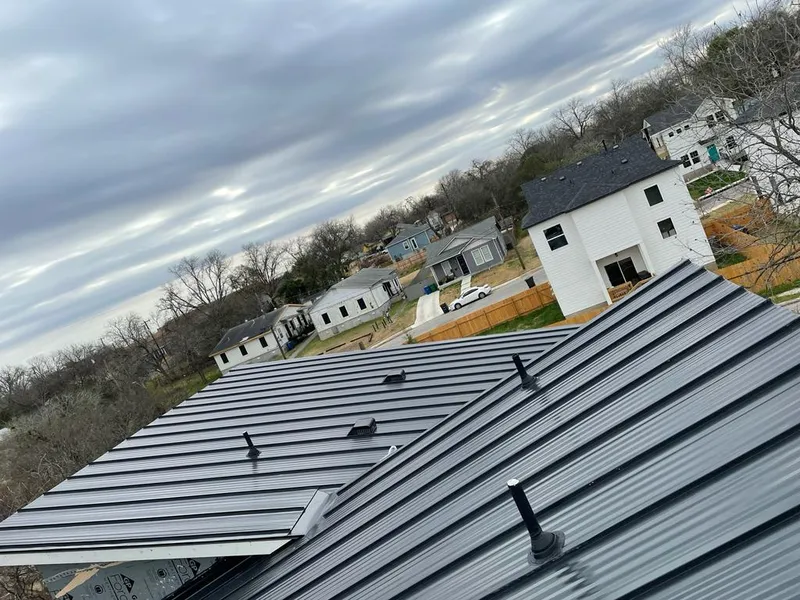 Standing seam metal roof panels with vents for Skylight Repair in Elk Grove Village